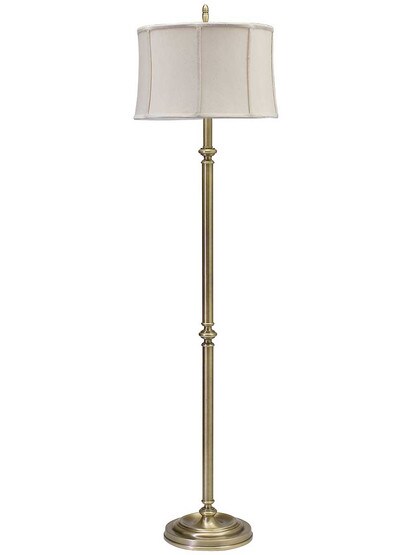 Coach Floor Lamp in Antique Brass.